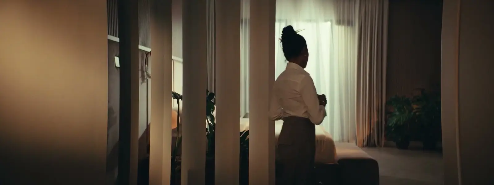 Still from Meraas's Nad Al Sheba Gardens film: a resident at home in a villa